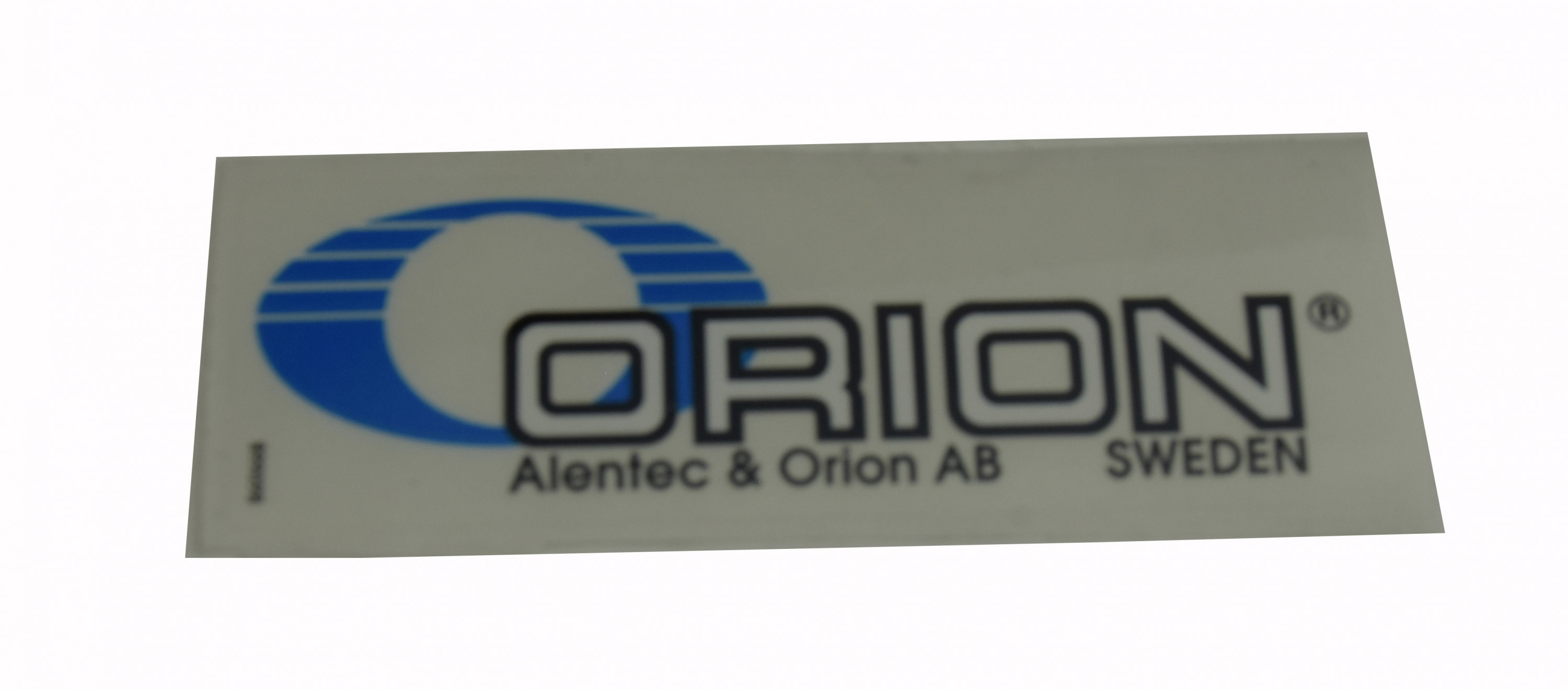 Sticker Orion 85X30mm Blue O, black text - Alentec & Orion AB